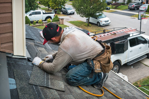 Professional Roofing technician working in Macksburg, IA